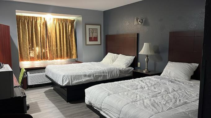 Blisspoint Inn & Suites, Northwood Экстерьер фото